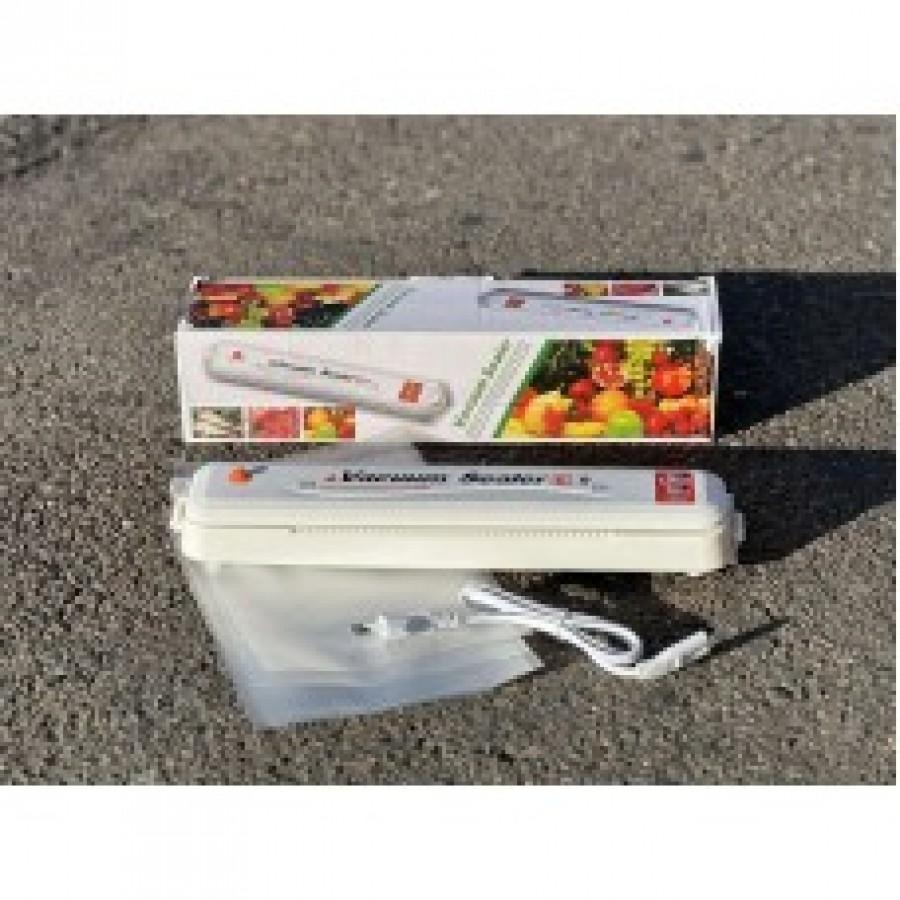 Вакуумний пакувальник побутовий — автоматичний апарат для продуктів, білий.